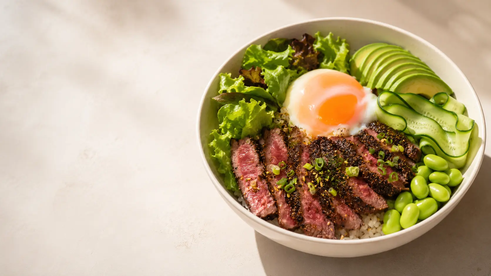 AI-enhanced HANI truffle beef bowl with egg, avocado, cucumber, edamame and fresh greens